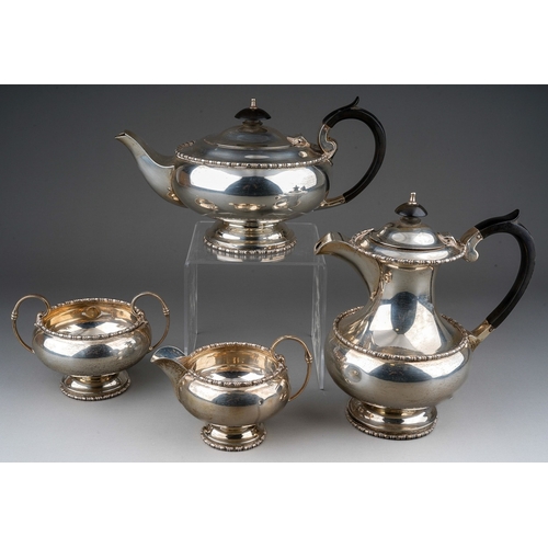 292 - A George VI silver four piece tea set to include: teapot, hot water or coffee jug, sugar bowl and mi... 