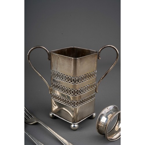 295 - A George V silver two handled cruet bottle holder on ball feet with pierced sides, hallmarked by S J... 