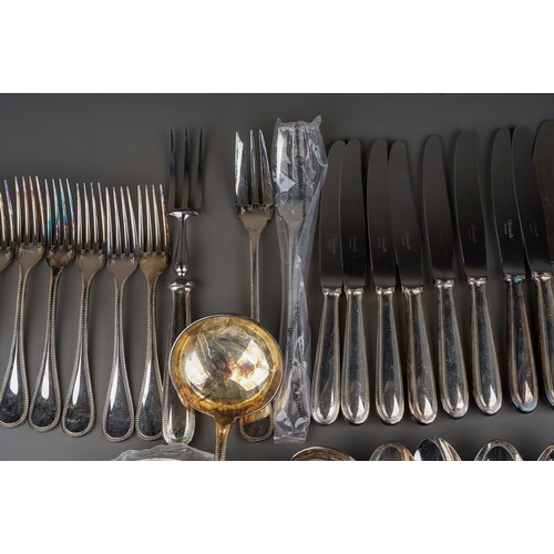 304 - A Christofle of Paris eight place silver plate flatware service, stamped, to include: 8 table spoons... 