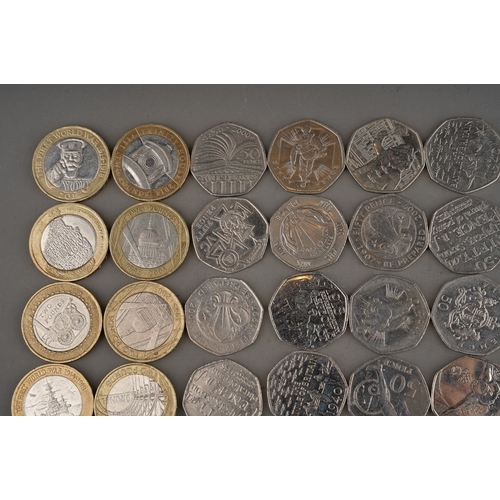 323 - A group of collector picture back 50 pence coins to include: 2004 VC mddal, 2017 Benjamin Bunny, Tom... 