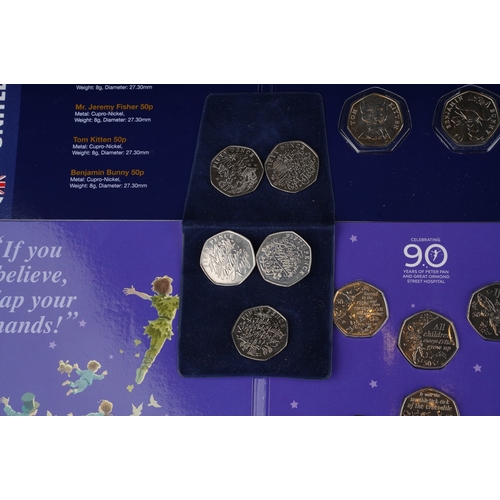 325 - A collection of one hundred and eighteen United Kingdom 50 pence coins, largely special edition,, in... 