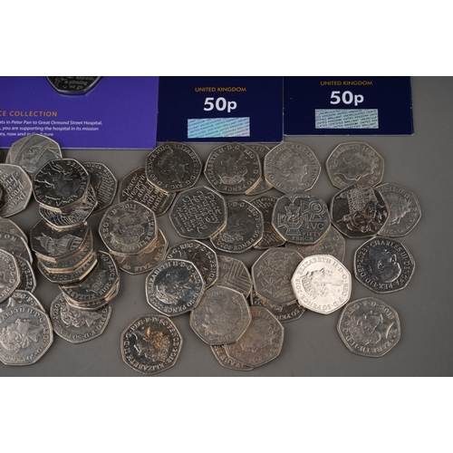 325 - A collection of one hundred and eighteen United Kingdom 50 pence coins, largely special edition,, in... 