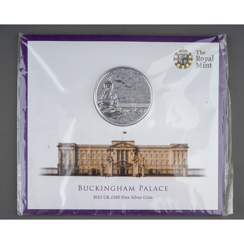 329 - A Royal Mint Buckingham Palace 2015 UK £100 Fine Silver Coin in cardboard and plastic packaging