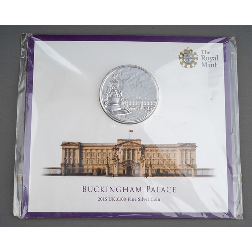 330 - A Royal Mint Buckingham Palace 2015 UK £100 Fine Silver Coin in cardboard and plastic packaging