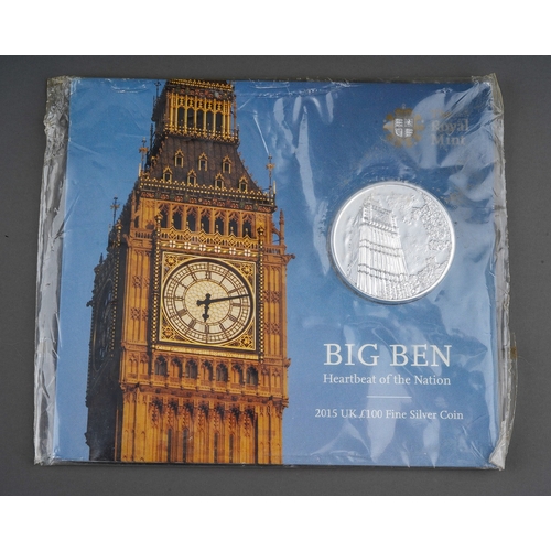 332 - A Royal Mint Big Ben 2015 UK £100 Fine Silver Coin, with cardboard and plastic packaging (damage to ... 