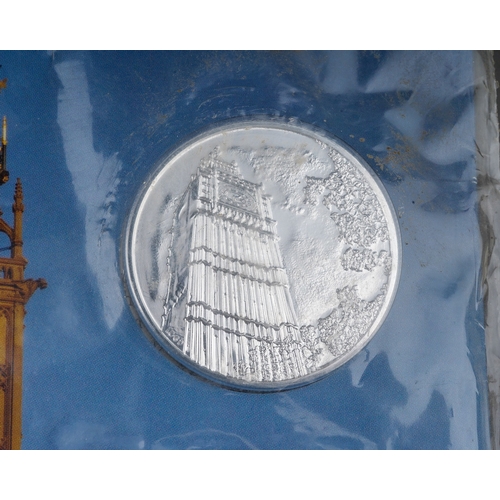 332 - A Royal Mint Big Ben 2015 UK £100 Fine Silver Coin, with cardboard and plastic packaging (damage to ... 