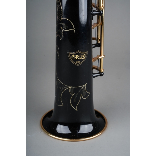 361 - A cased Opus Soprano saxophone, black lacquered and brass finish, some small areas of tarnish  rust ... 