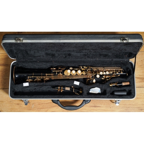 361 - A cased Opus Soprano saxophone, black lacquered and brass finish, some small areas of tarnish  rust ... 