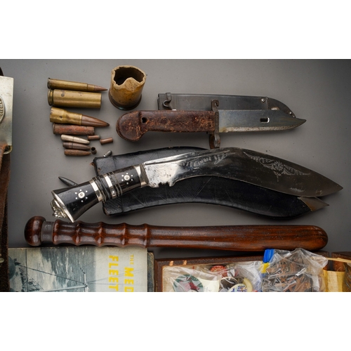 395 - A box of militaria including bayonet & Kukri