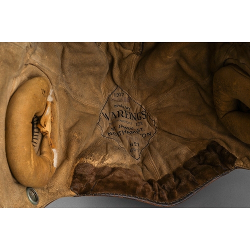 398 - A WW2 brown leather flying helmet, bears label to the interior for Wareings of St. James St, Northam... 