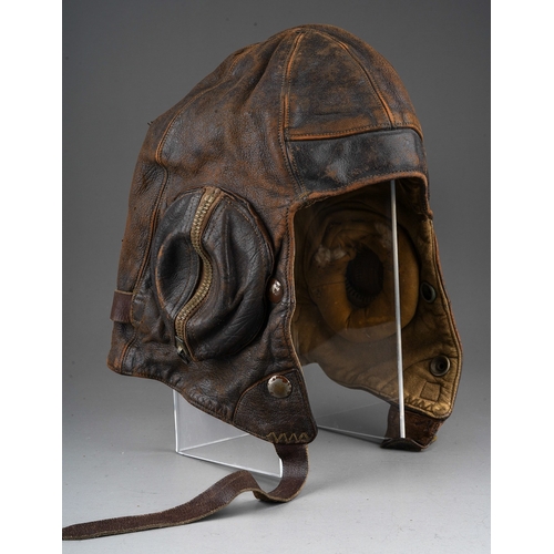 398 - A WW2 brown leather flying helmet, bears label to the interior for Wareings of St. James St, Northam... 