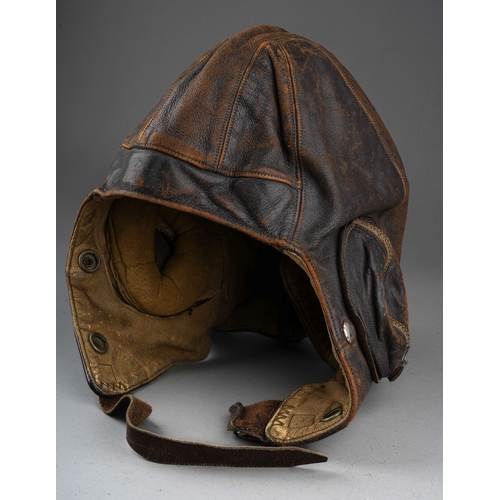 398 - A WW2 brown leather flying helmet, bears label to the interior for Wareings of St. James St, Northam... 