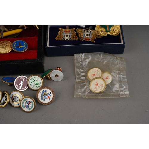 404 - Assorted vintage gilt metal some enamelled tie pins, shirt studs, various badges including enamelled... 