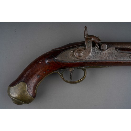 406 - A 19th century percussion pistol converted from a flint lock, stamped Tower GR, walnut with brass bu... 