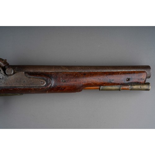 406 - A 19th century percussion pistol converted from a flint lock, stamped Tower GR, walnut with brass bu... 