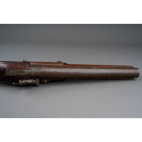 406 - A 19th century percussion pistol converted from a flint lock, stamped Tower GR, walnut with brass bu... 