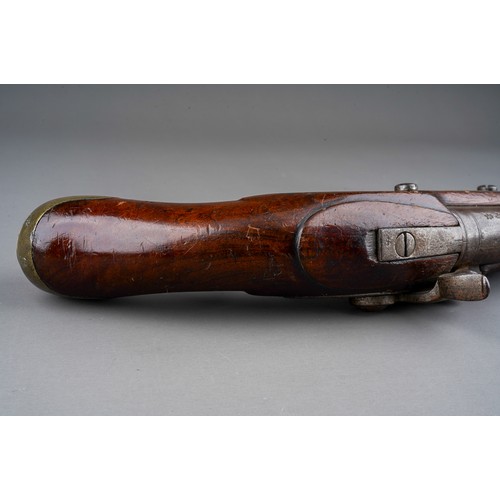 406 - A 19th century percussion pistol converted from a flint lock, stamped Tower GR, walnut with brass bu... 