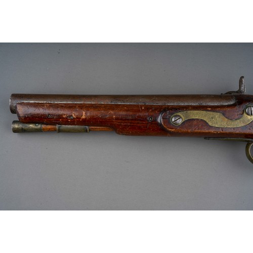 406 - A 19th century percussion pistol converted from a flint lock, stamped Tower GR, walnut with brass bu... 