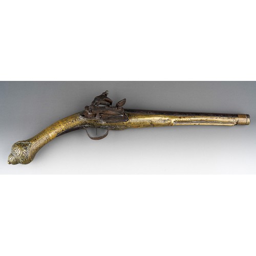 407 - A 19th century miquelet brass flint lock pistol, with stamped decoration throughout, lacks ram rod, ... 