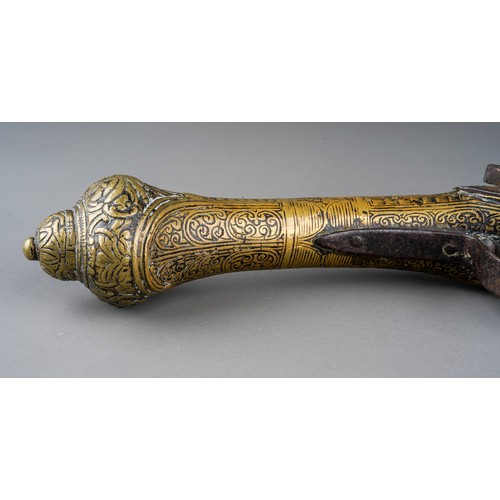 407 - A 19th century miquelet brass flint lock pistol, with stamped decoration throughout, lacks ram rod, ... 