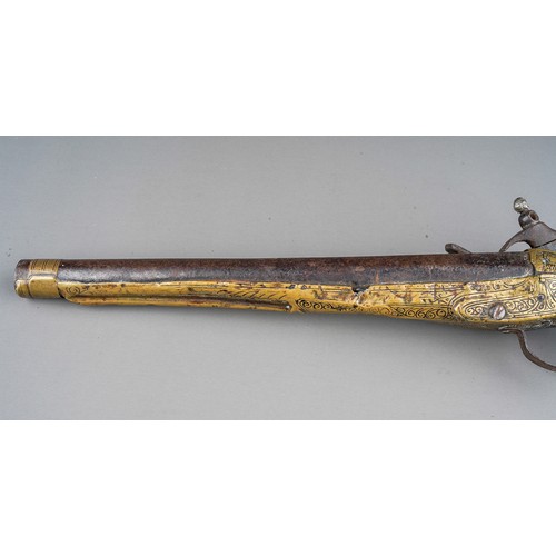 407 - A 19th century miquelet brass flint lock pistol, with stamped decoration throughout, lacks ram rod, ... 