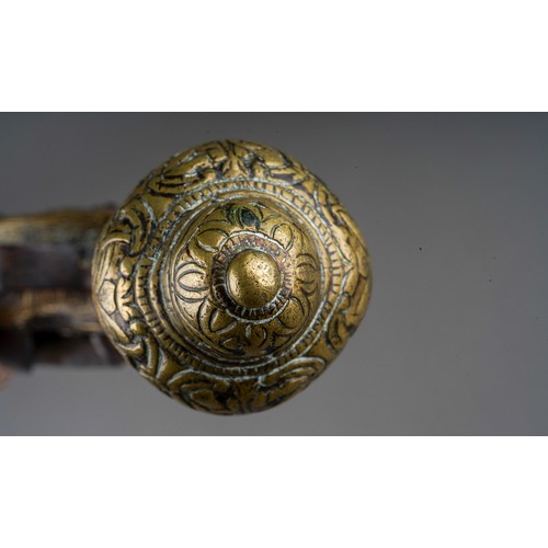 407 - A 19th century miquelet brass flint lock pistol, with stamped decoration throughout, lacks ram rod, ... 