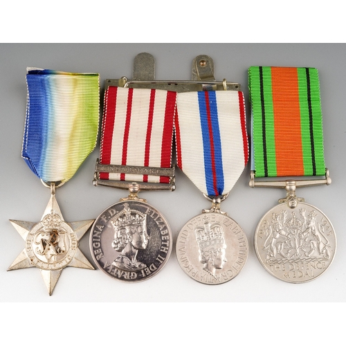 415 - WW2 and later Royal Navy medal group to LT. D C Lawrence, comprising of: WW2 Atlantic Star, Defence ... 