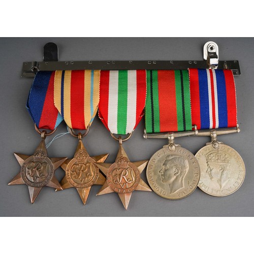 421 - WWII medal group to include: a 1939-1945 Star, Africa Star Italy Star, 1945-1946 War and Defence tog... 