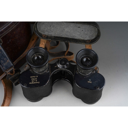 424 - Dienstglas military binoculars complete with case.