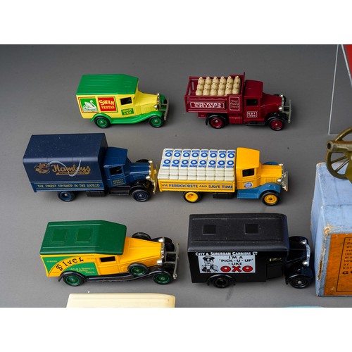 435 - A vintage boxed Schuco Telesteering tinplate clock work car with accessories together with boxed Gun... 