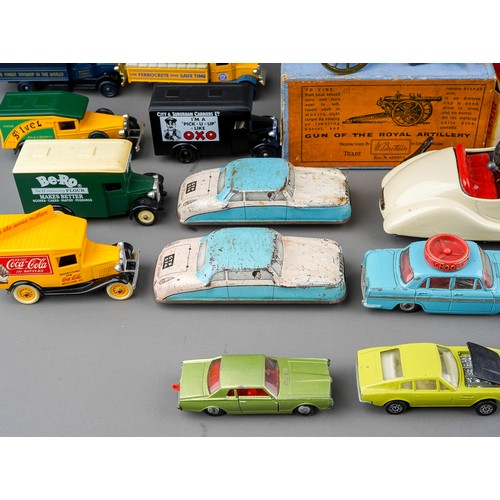 435 - A vintage boxed Schuco Telesteering tinplate clock work car with accessories together with boxed Gun... 