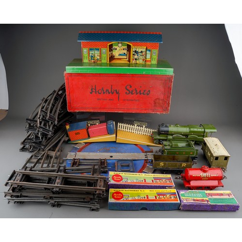 436 - A collection of Hornby Series produced by Meccano tin plate 'O' gauge railwayana to include: Flying ... 