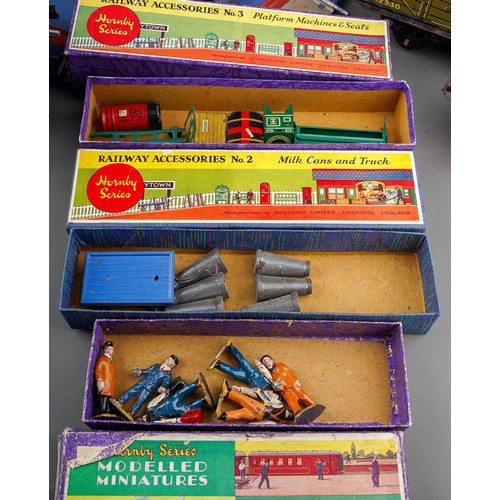 436 - A collection of Hornby Series produced by Meccano tin plate 'O' gauge railwayana to include: Flying ... 