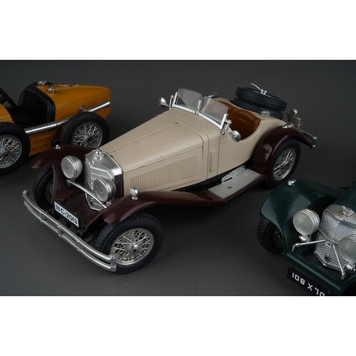 438 - Three Burago 1/18 models of vintage open top cars, comprising a Jaguar SS100, a Mercedes Benz SS4 an... 