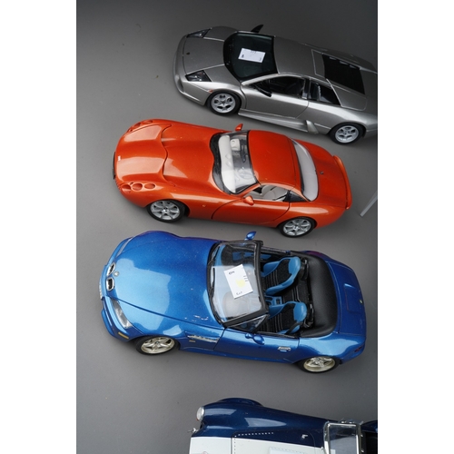 441 - A collection of eight die cast 1:18 model cars to include: Maisto Morgan Aero 8; JADI TVR Tuscan; Ma... 