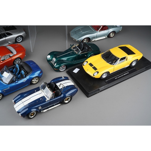 441 - A collection of eight die cast 1:18 model cars to include: Maisto Morgan Aero 8; JADI TVR Tuscan; Ma... 