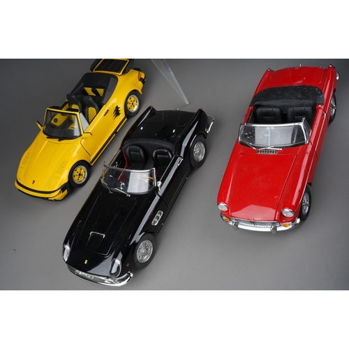 442 - A collection of seven die cast 1/18 model cars to include: Minichamps Mercedes-Benz 300 SL; UT Model... 