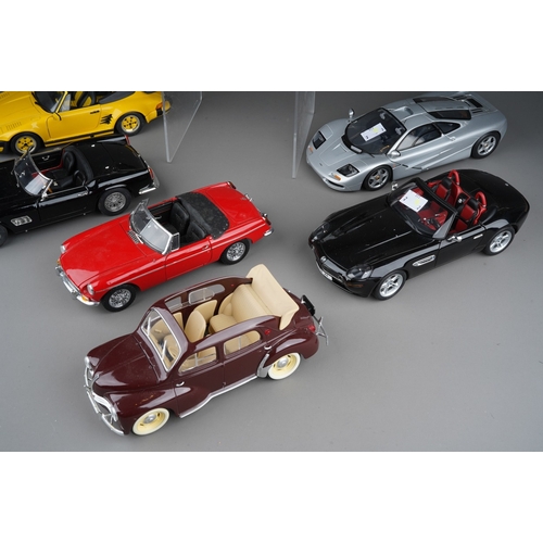 442 - A collection of seven die cast 1/18 model cars to include: Minichamps Mercedes-Benz 300 SL; UT Model... 