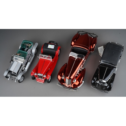 445 - Four diecast 1:18 model cars to include: ERTL 1935 Auburn 851 boat tail speedster; Franklin Mint 193... 