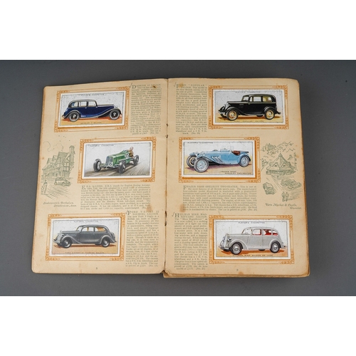 458 - Four 1930s cigaratte card albums to include: John Player & Sons Motor Cars (1st and 2nd Series)  and... 