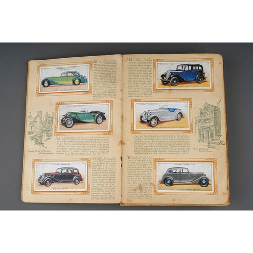 458 - Four 1930s cigaratte card albums to include: John Player & Sons Motor Cars (1st and 2nd Series)  and... 