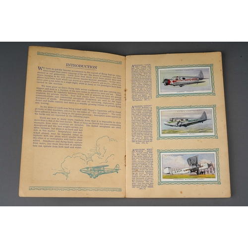 458 - Four 1930s cigaratte card albums to include: John Player & Sons Motor Cars (1st and 2nd Series)  and... 