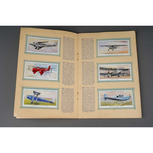 458 - Four 1930s cigaratte card albums to include: John Player & Sons Motor Cars (1st and 2nd Series)  and... 