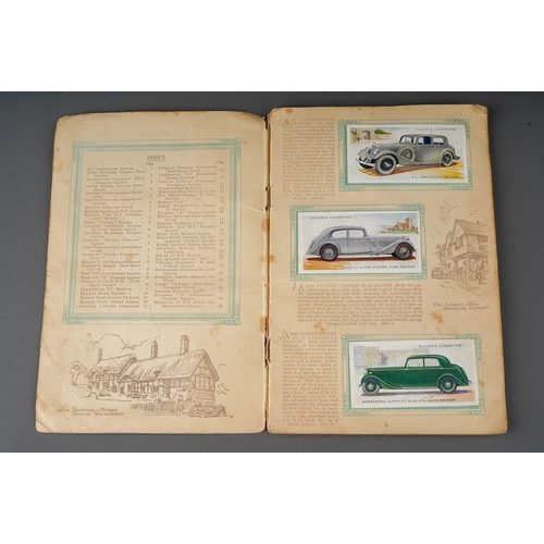 458 - Four 1930s cigaratte card albums to include: John Player & Sons Motor Cars (1st and 2nd Series)  and... 