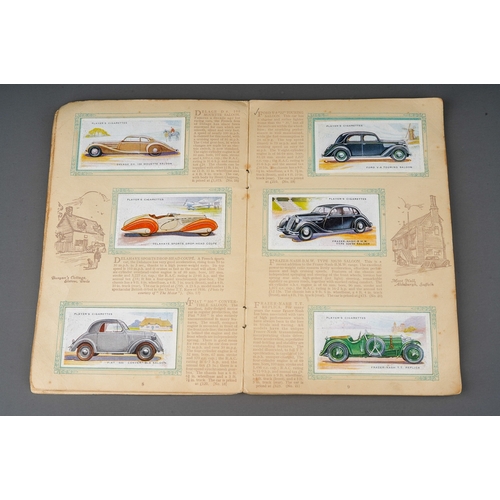 458 - Four 1930s cigaratte card albums to include: John Player & Sons Motor Cars (1st and 2nd Series)  and... 