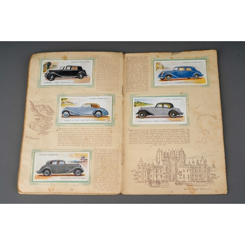 458 - Four 1930s cigaratte card albums to include: John Player & Sons Motor Cars (1st and 2nd Series)  and... 