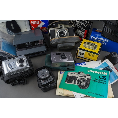 482 - A collection of film and digital camera equipment including Polaroid Spectra 2, 600 polaroid film an... 