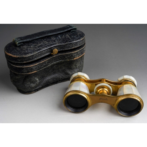 490 - A pair of early 20th century cased Busch gilt metal and mother of pearl opera glasses