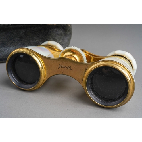 490 - A pair of early 20th century cased Busch gilt metal and mother of pearl opera glasses