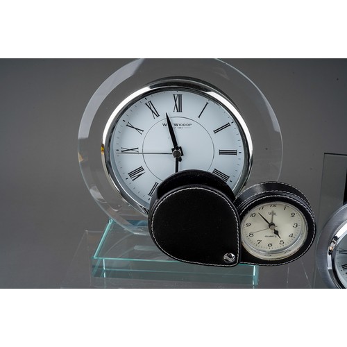 491 - Assorted clocks and table accessories to include: two William Widdop boxed round glass mantel clocks... 